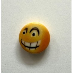 Smiley knap overrasket